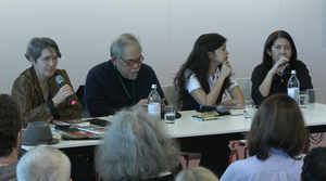 Speaker*innen auf Bühne