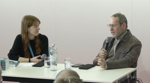 Speaker*innen auf Bühne